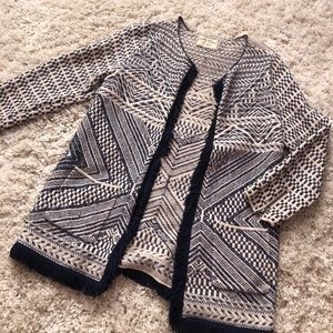 white and blue patterned cardigan